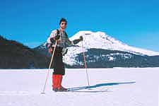 Sparks Lake, South Sister, Oregon Jon Holmquist standing on frozen Sparks Lake