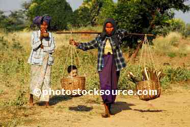 Woman Carrying Baskets