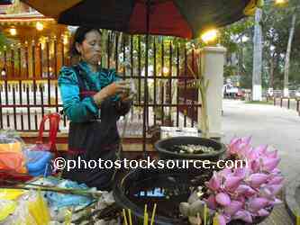 Woman Selling Flowers
