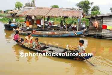 Boy Paddling Boat