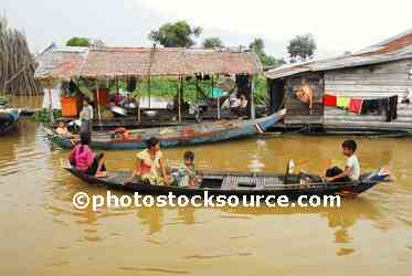 Boy Paddling Boat