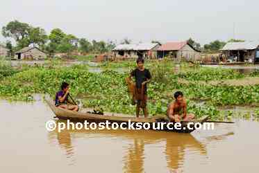 Boys Fishing From Canoe