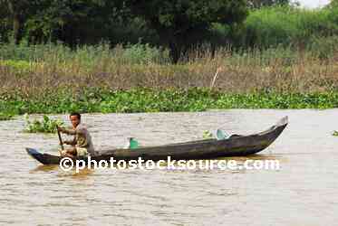 Man Paddling Canoe