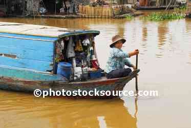 Woman Paddling Boat