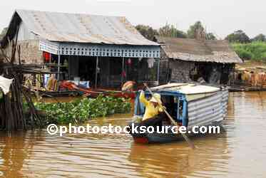 Woman Paddling Boat