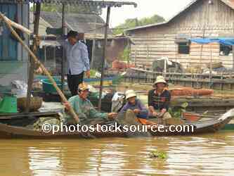 People Scaling Fish
