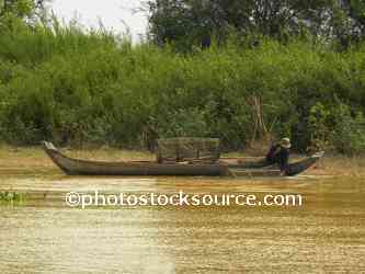 Man Setting Fish Traps