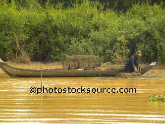 Man Setting Fish Traps