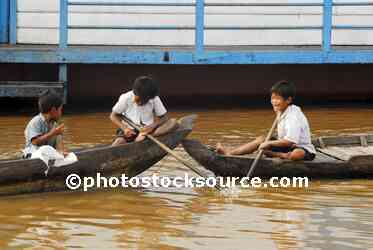 Boys Playing on Boats