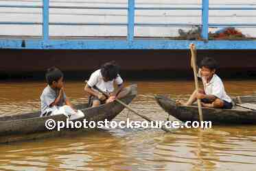 Boys Playing on Boats