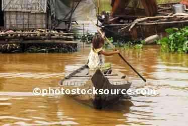 Girl Paddling Canoe