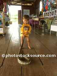 Little Boy with Big Snake