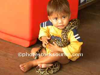 Little Boy with Big Snake