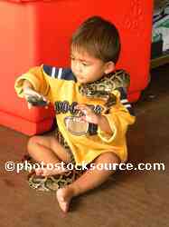 Little Boy with Big Snake