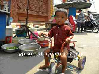 Little Boy on Tricycle