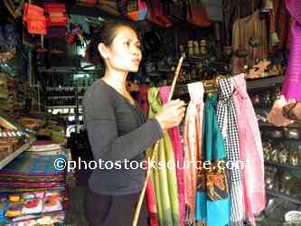 Woman Selling Scarves