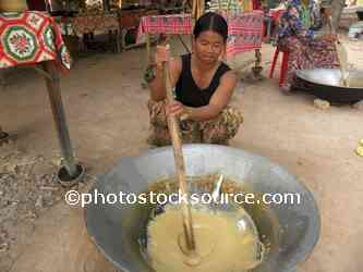 Woman Stirring Palm Sugar
