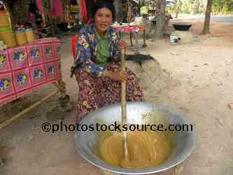 Woman Stirring Palm Sugar