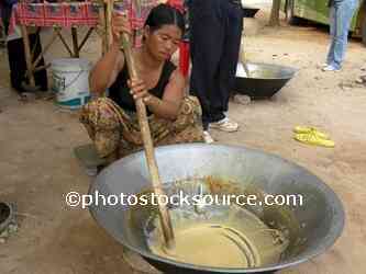 Woman Stirring Palm Sugar