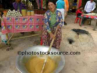 Woman Stirring Palm Sugar
