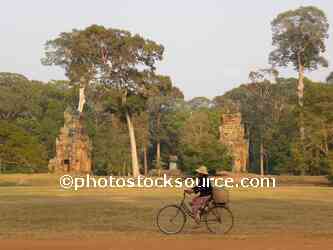 Woman Riding Bicycle