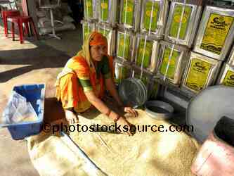 Women Packaging Grain