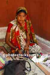 Young Woman Sewing