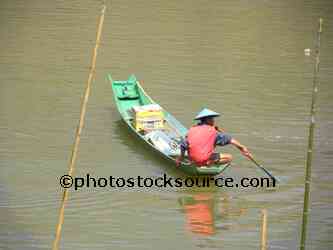 Man Paddling Boat