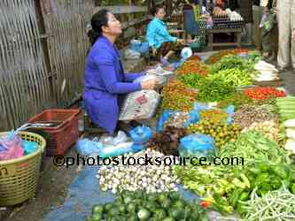 Woman Selling Vegetables