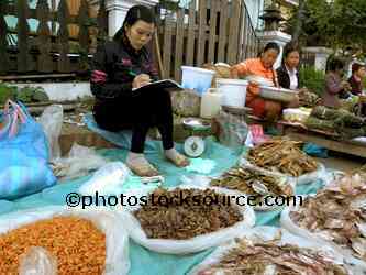 Woman Selling Dried Fish