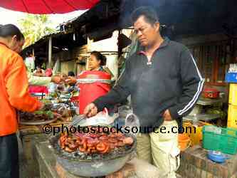 Man Cooking Sausage