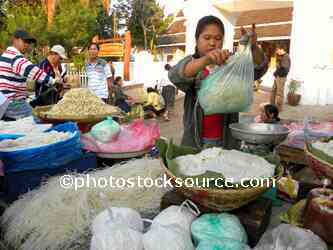 Woman Selling Rice Noodles