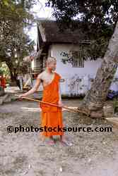 Monk with Broom