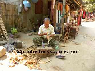 Men Carving Wood