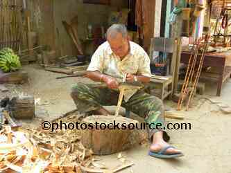 Men Carving Wood
