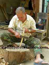 Men Carving Wood