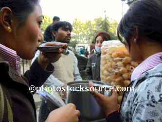 Women Sipping Soup