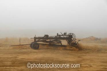 Grass Cutter in Fog