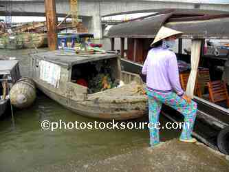 Woman by Boat