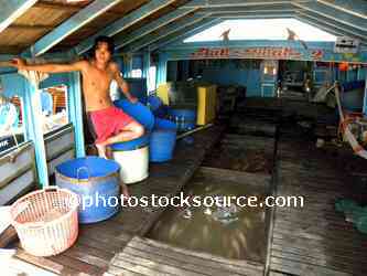 Fish Farm Beneath Boat