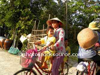 Woman and Child on Bike