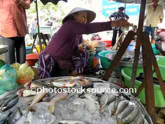 Woman Selling Fish