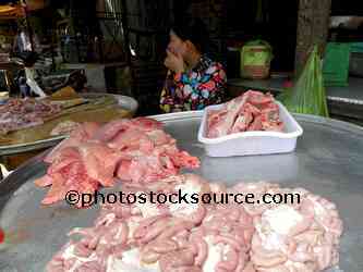 Woman Selling Meat