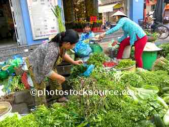 Woman Selling Vegetables