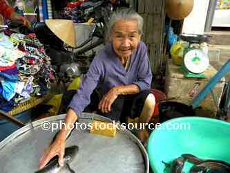 Woman Selling Fish