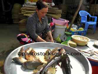 Woman Selling Fish