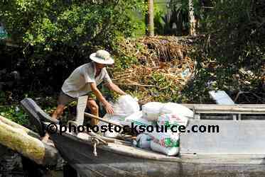 Man Loading Sampan