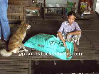 Woman at Fish Farm