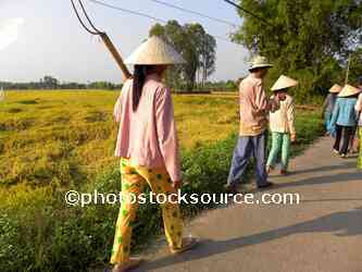 Workers Walking on Path